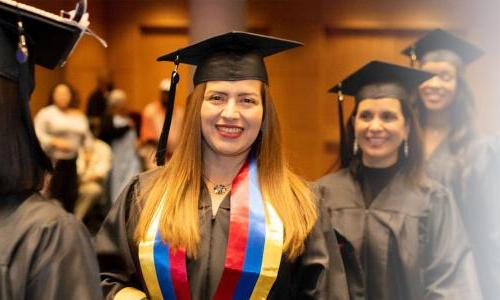 Herzing Indiana Online BSN Student Smiling at Graduation Ceremony 